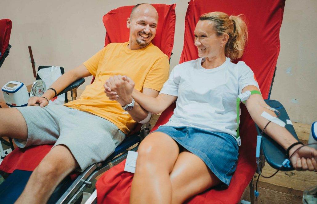Giving blood together.