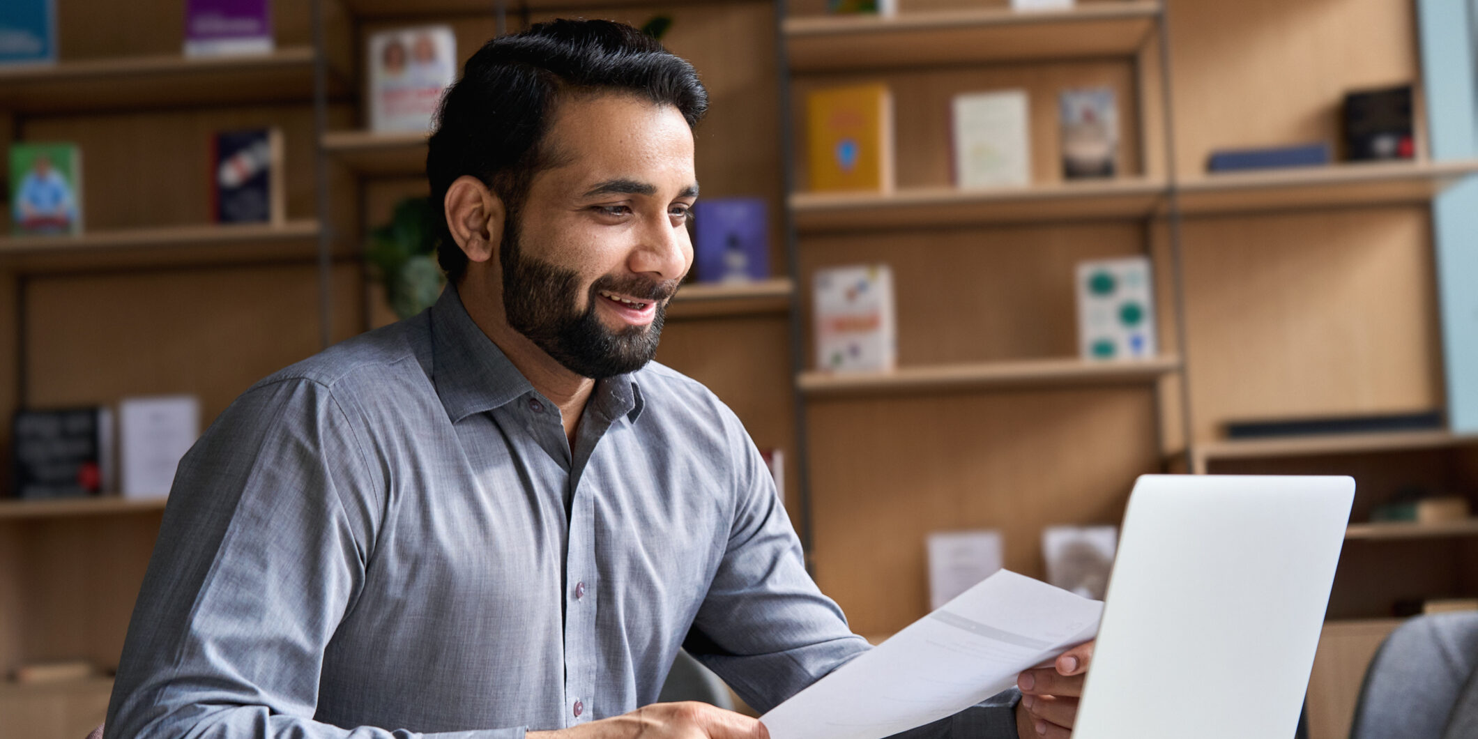 Professional reviewing compliance guidelines and changes.
