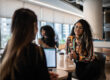 Coworkers talking in the office